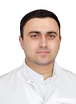 Врач Емузов Султанбек Вячеславович